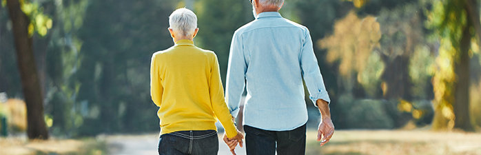 Older couple going for a walk.